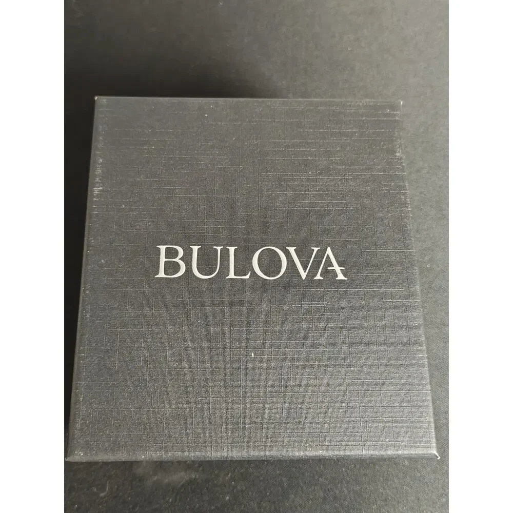 Caravelle by BULOVA 30mm Woman's Corporate Day / Date White Dial Watch NWB